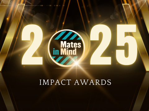 A bright banner with gold columns on either side and spotlights to highlight the Mates in Mind 2025 Impact Awards
